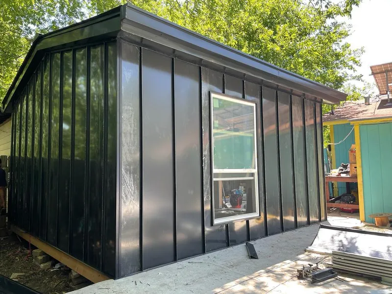 Black standing seam metal wall panels for Metal Roof Installation in San Buenaventura (Ventura)