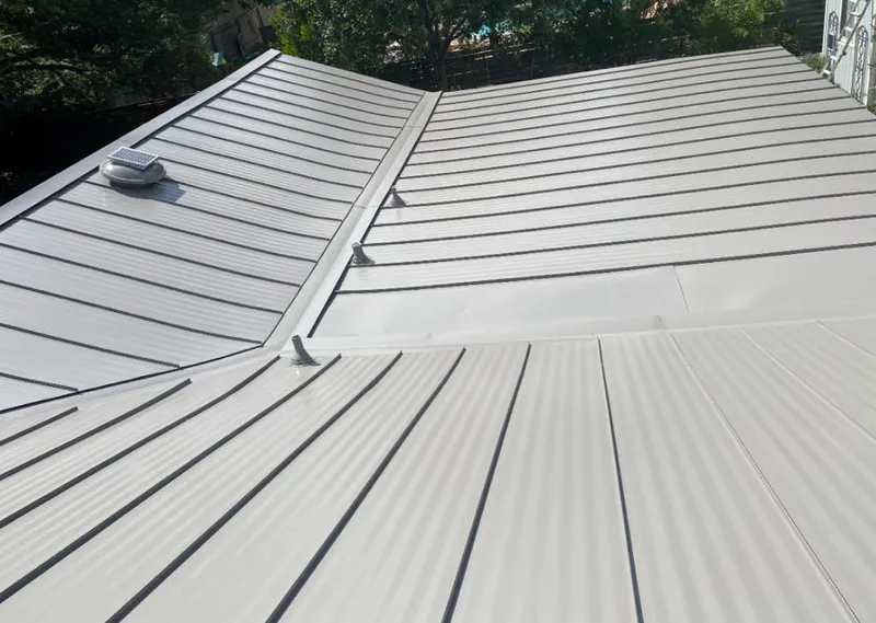Solar attic fan installed on a metal roof for Roof Ventilation in San Buenaventura (Ventura)